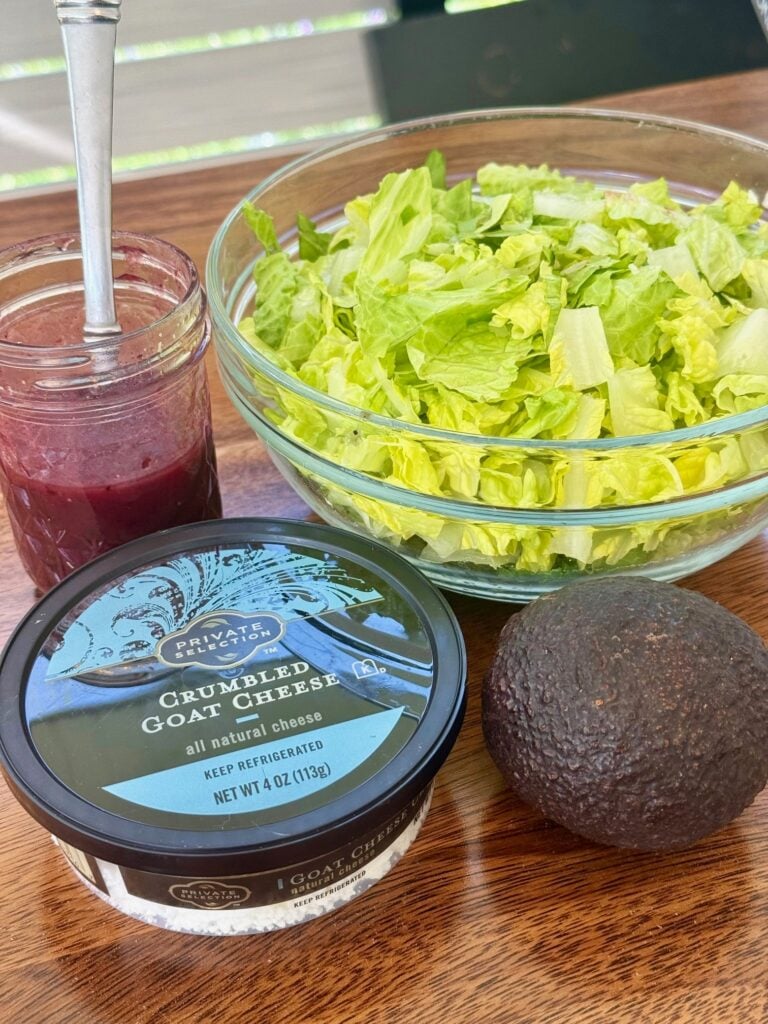 salad ingredients with homemade blackberry lime dressing