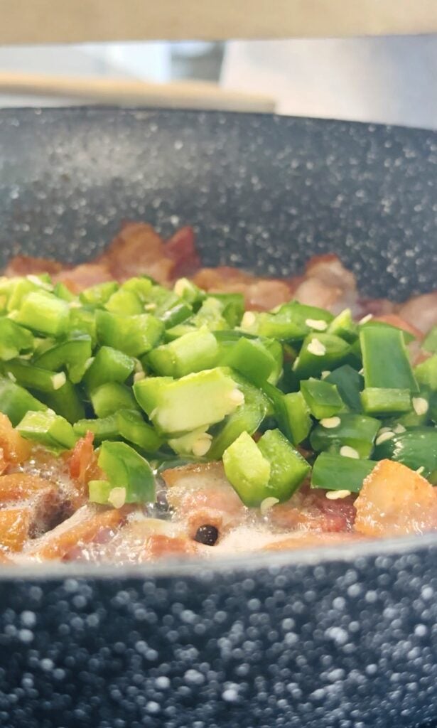 bacon and jalapenos in a skillet