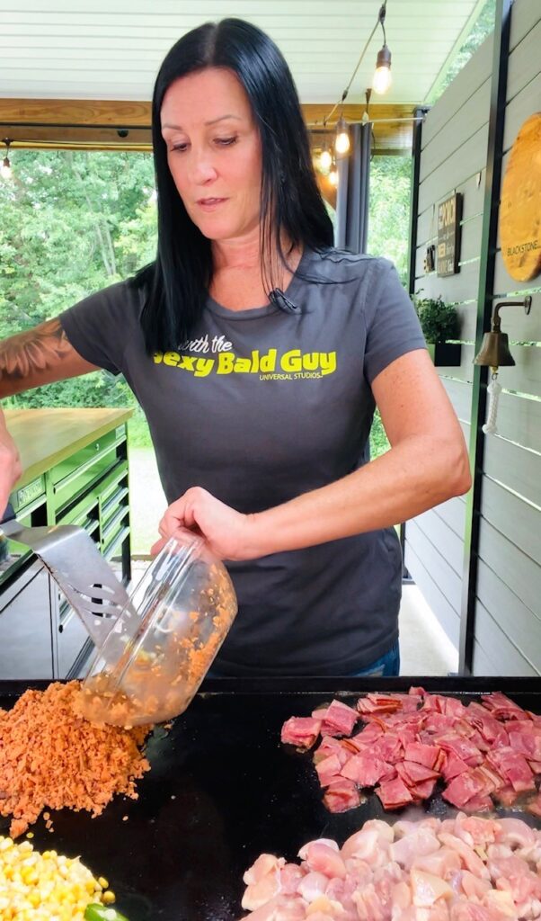 adding sweet potato rice to griddle