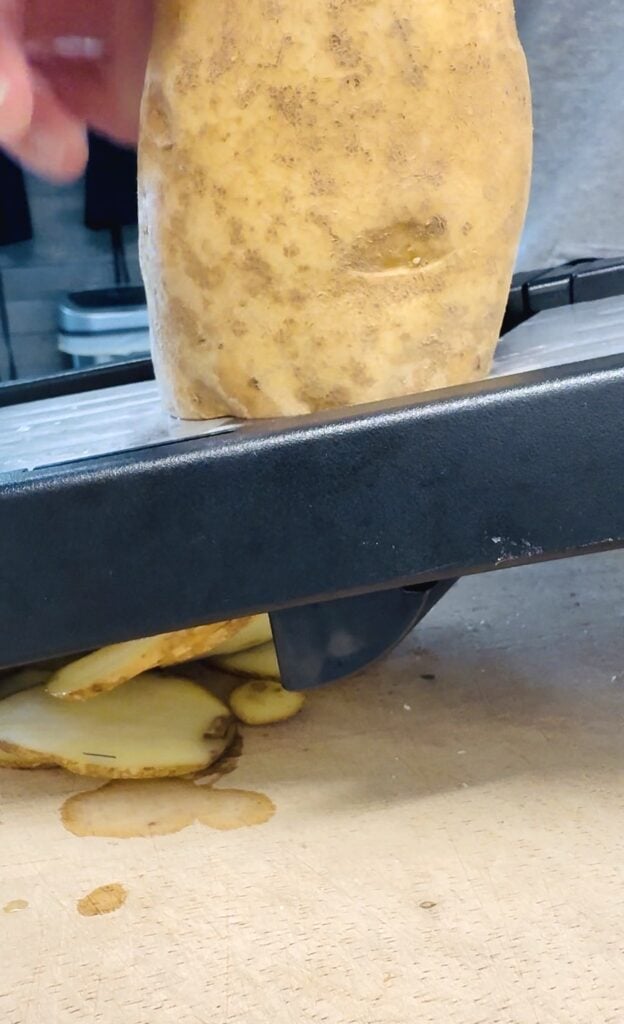 slicing potatoes